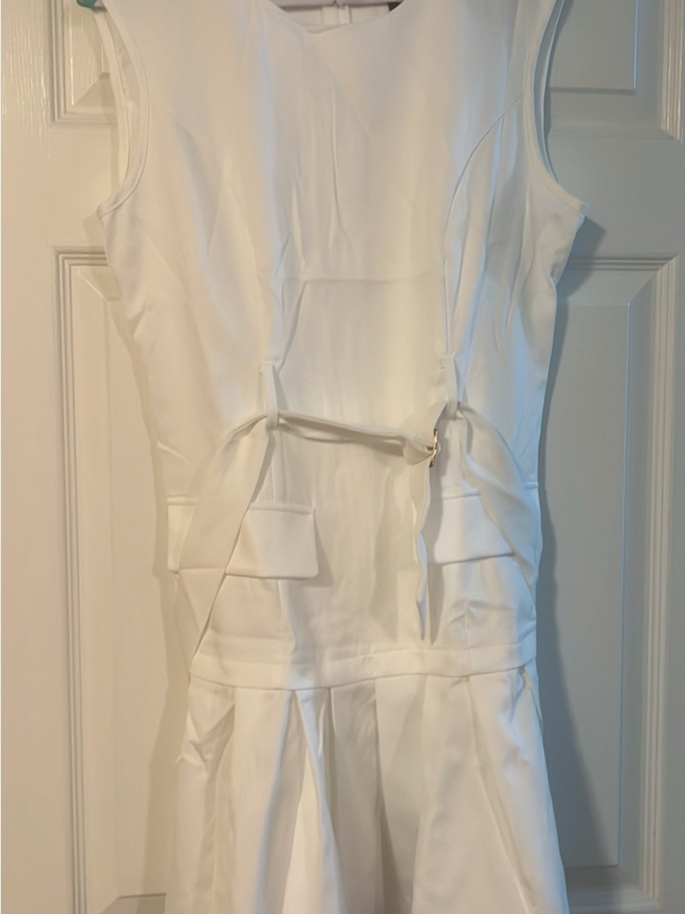 White Sleeveless Jumpsuit with Pleated Skirt